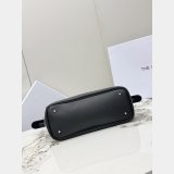 The Row Ewa curved handbag