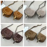 Marcie saddle bag in suede leather